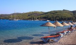 Muğla'nın Menteşe ilçesine bağlı Akbük sahilinde plajın bir bölümü ücretsiz olarak halka açıldı